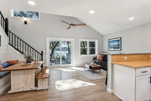 interior space with recessed lighting, stairway, light wood-style floors, and a ceiling fan