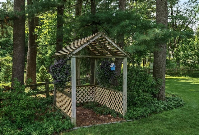 view of outbuilding with a lawn