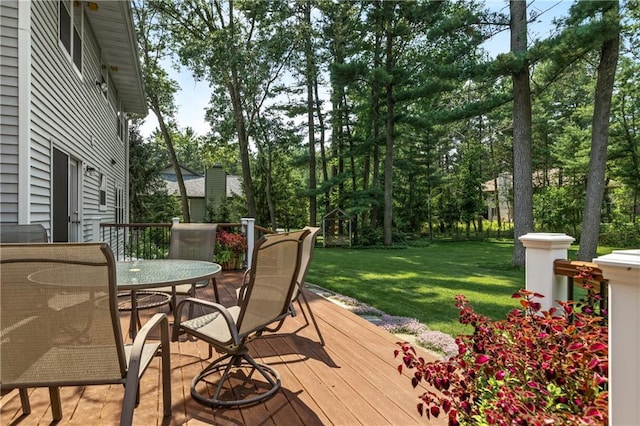 wooden deck with a yard