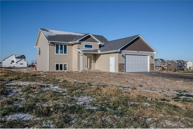 view of front of property with a garage