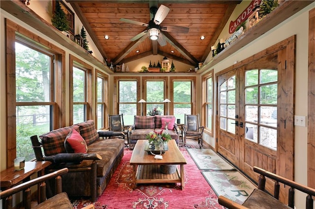 sunroom with vaulted ceiling, wooden ceiling, ceiling fan, and french doors