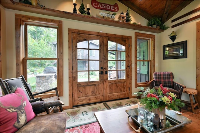 entryway featuring lofted ceiling, wooden ceiling, and french doors