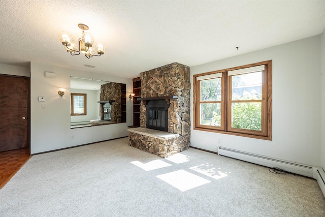 unfurnished living room featuring a notable chandelier, light colored carpet, a textured ceiling, and a stone fireplace