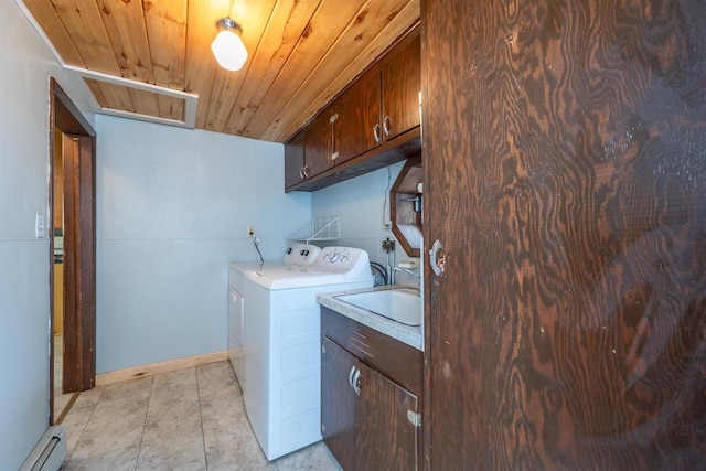 laundry area featuring wood ceiling, cabinets, washer and dryer, light tile patterned flooring, and a baseboard heating unit