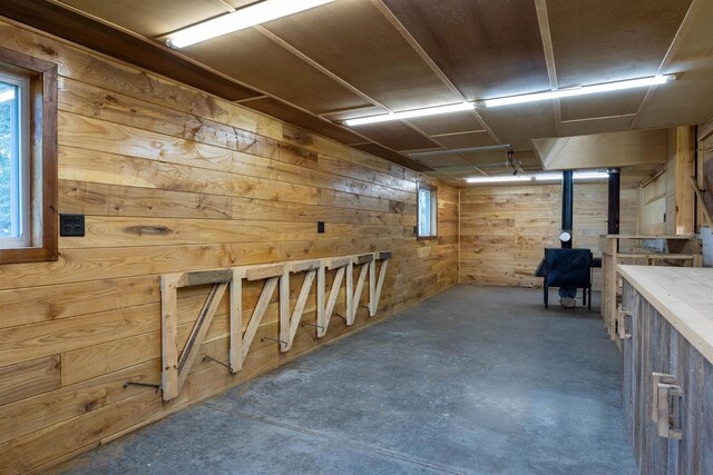 interior space featuring wood walls