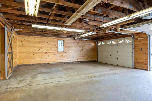 garage with wood walls