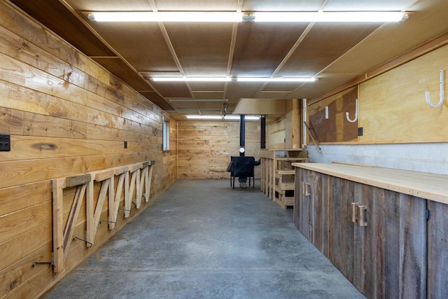 interior space featuring wood walls