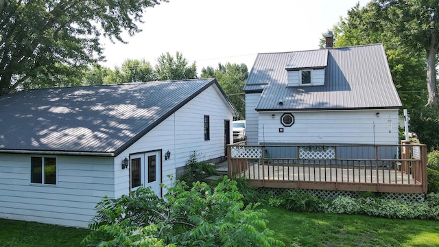 rear view of house with a deck