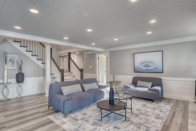 living room featuring hardwood / wood-style floors and wooden ceiling