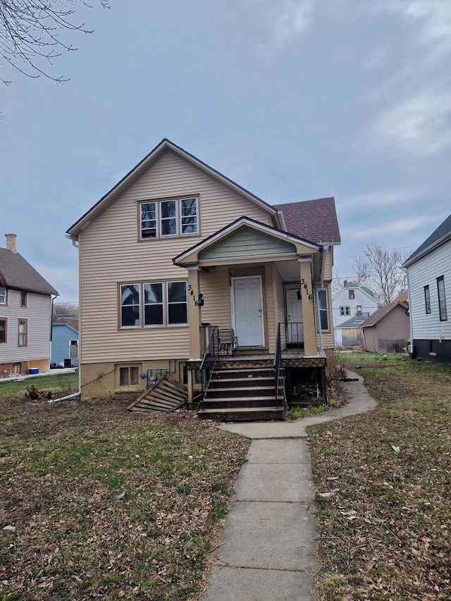 bungalow-style home with covered porch