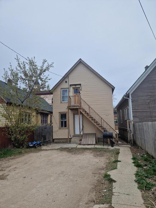 rear view of house with a deck