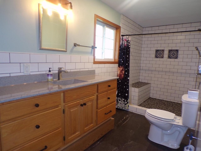 bathroom with tile walls, walk in shower, vanity, and toilet