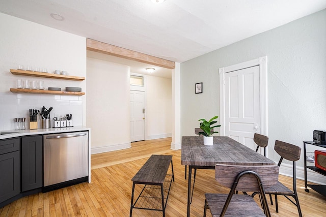 dining space with light hardwood / wood-style flooring