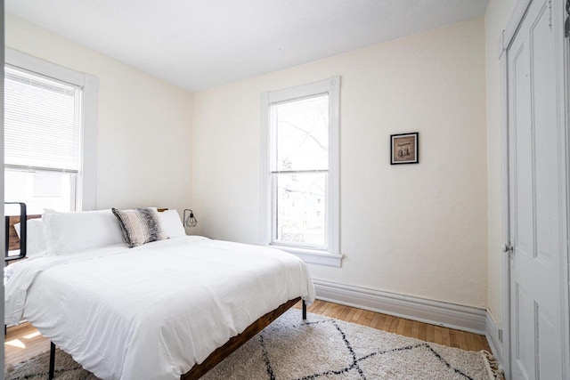 bedroom featuring hardwood / wood-style flooring