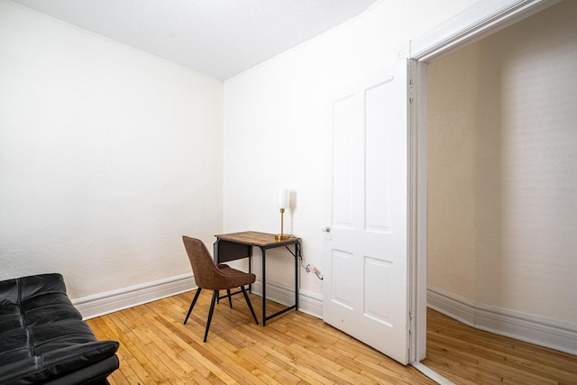 office area with light hardwood / wood-style flooring