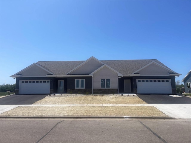 single story home with a garage