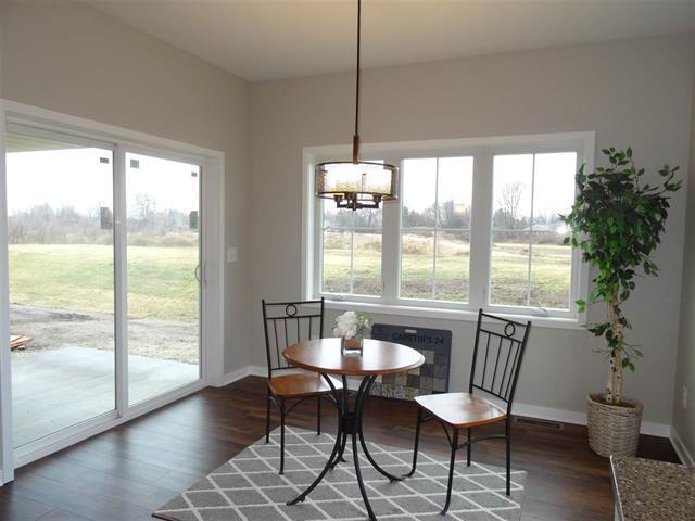 dining room with dark wood-type flooring