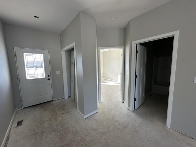 interior space with visible vents and baseboards