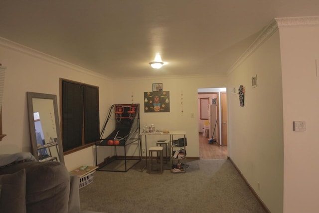 interior space with ornamental molding and light colored carpet