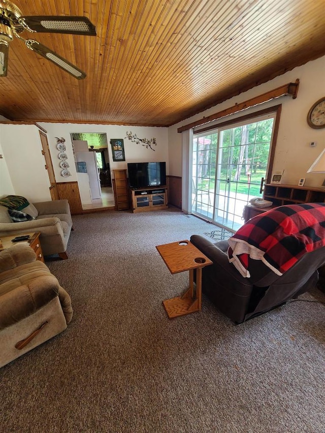 carpeted living room featuring wooden ceiling