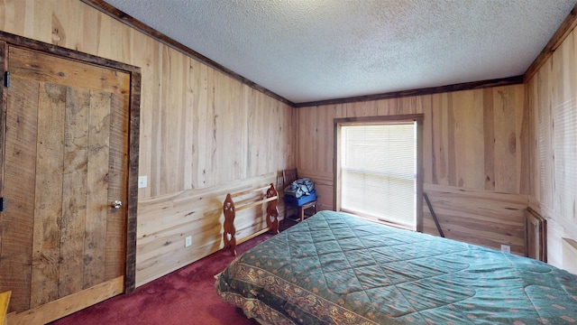 20649 Julia Rd, Clifton, WI 54618 - carpeted bedroom featuring ornamental molding, wooden walls, and a textured ceiling