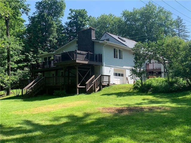 back of house with a lawn and a wooden deck