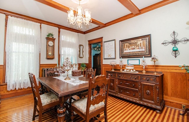 carpeted dining space featuring an inviting chandelier, beam ceiling, and plenty of natural light