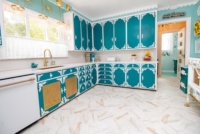 kitchen featuring tasteful backsplash, hanging light fixtures, sink, and dishwasher