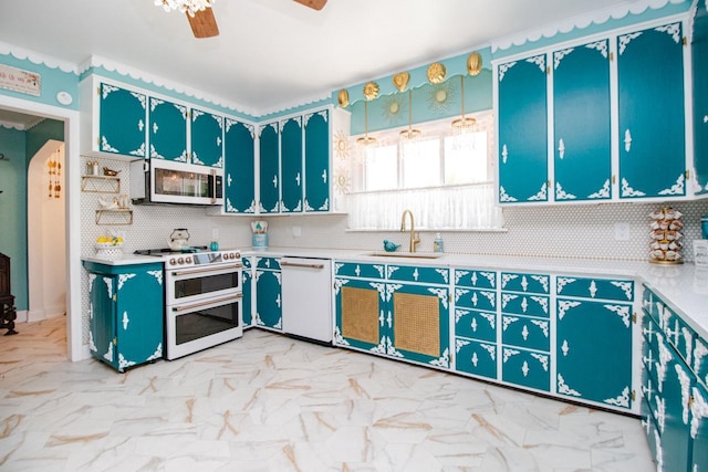 kitchen with sink, tasteful backsplash, hanging light fixtures, ceiling fan, and white appliances