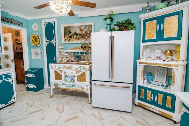 interior space featuring high end white refrigerator and ceiling fan