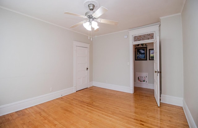 unfurnished bedroom with ceiling fan, ornamental molding, and light hardwood / wood-style floors