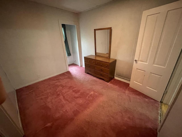 unfurnished bedroom featuring carpet