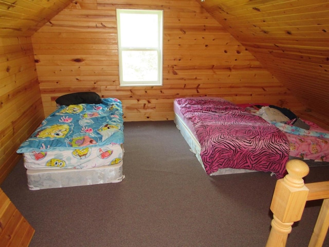 carpeted bedroom featuring wood ceiling, lofted ceiling, and wooden walls