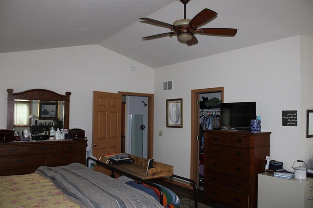 bedroom featuring ceiling fan, vaulted ceiling, and a closet