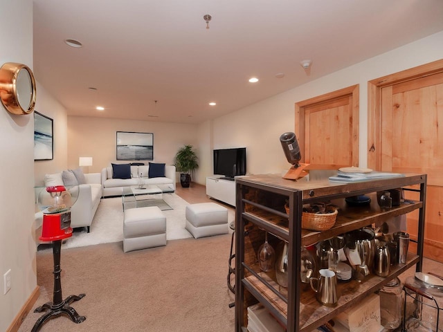 living room featuring light colored carpet