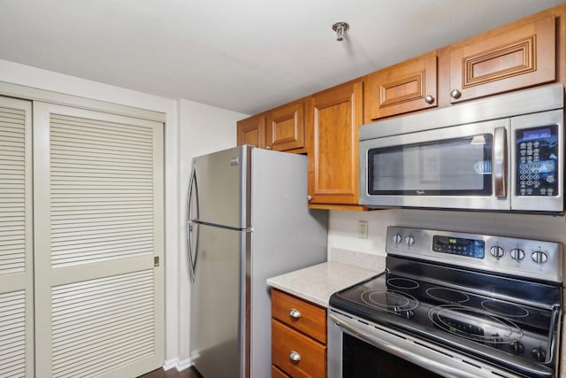 kitchen with appliances with stainless steel finishes