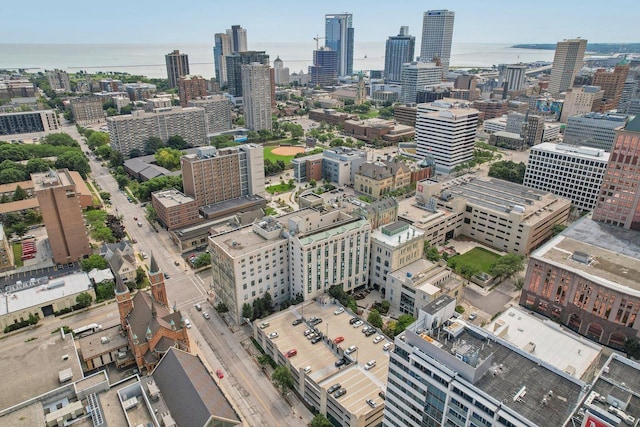 property's view of city featuring a water view