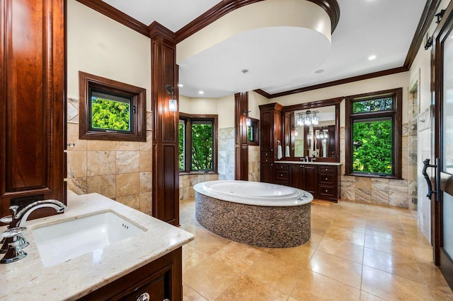 bathroom with crown molding, vanity, tile walls, and a wealth of natural light