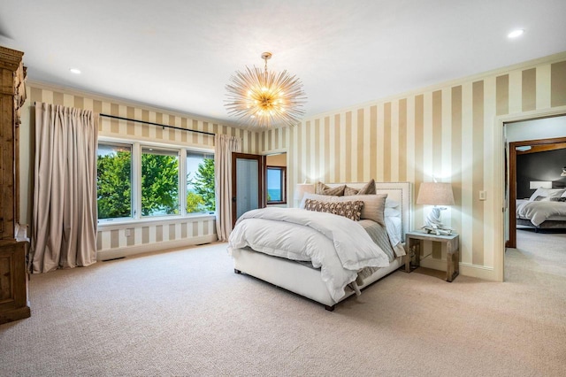 bedroom with crown molding, a chandelier, and carpet