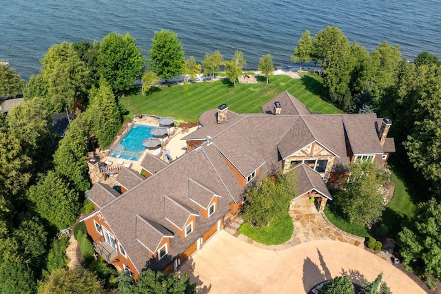 bird's eye view with a water view