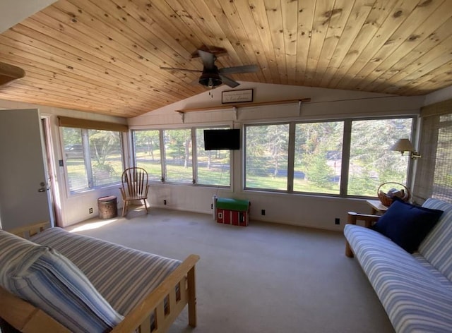 sunroom / solarium with wooden ceiling, lofted ceiling, and a wealth of natural light