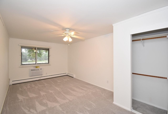 unfurnished bedroom with ceiling fan, a baseboard heating unit, a wall unit AC, ornamental molding, and light colored carpet