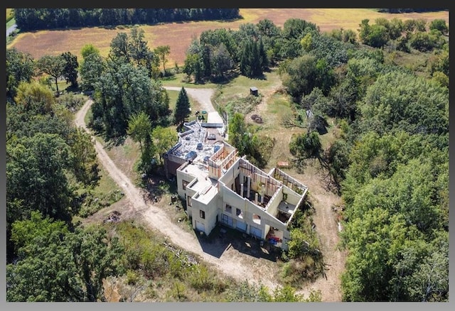 birds eye view of property featuring a rural view