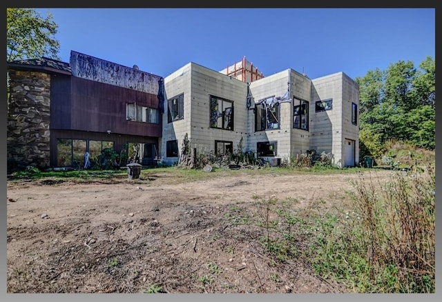 exterior space with a garage