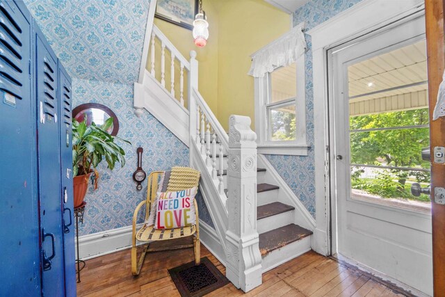 entryway featuring hardwood / wood-style floors and a wealth of natural light