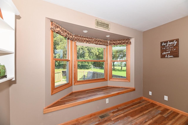 interior space with hardwood / wood-style flooring