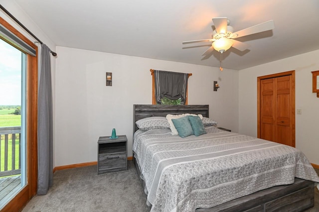 carpeted bedroom with a closet and ceiling fan