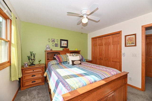 bedroom featuring a closet, ceiling fan, and light carpet