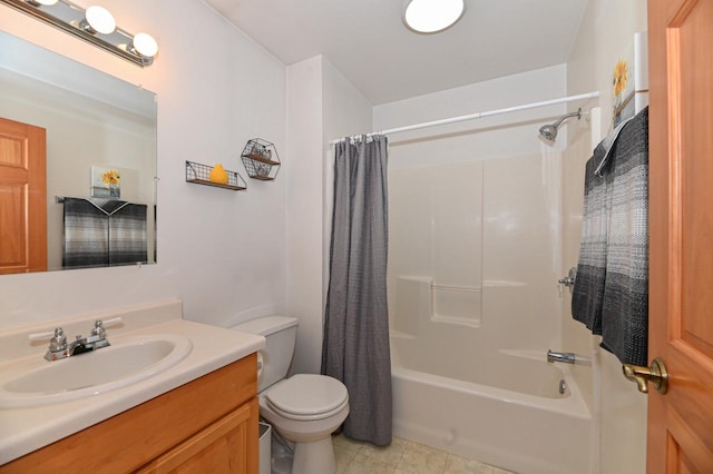 full bathroom with tile patterned floors, toilet, shower / tub combo, and vanity