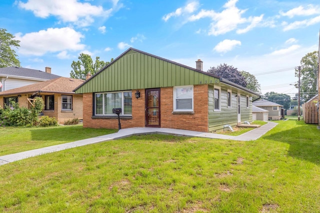 single story home with a front lawn